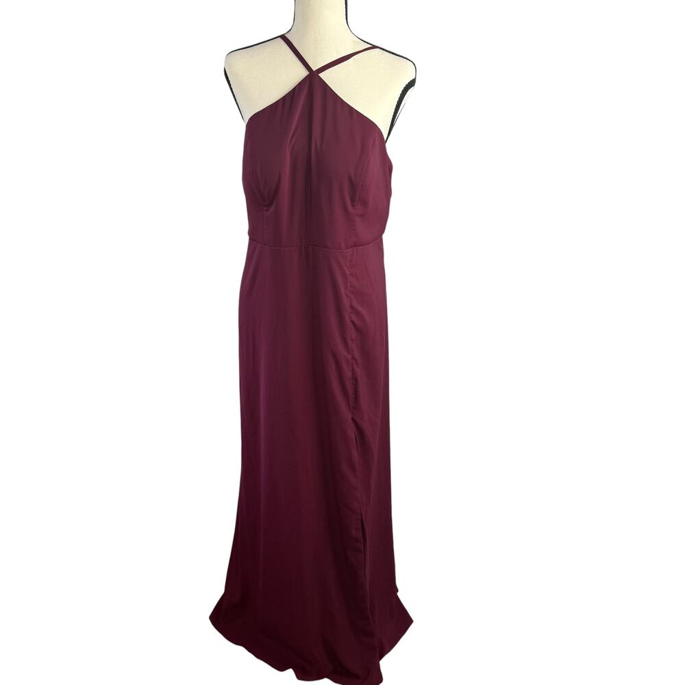 Azazie burgundy maxi dress with open back and crisscross straps.